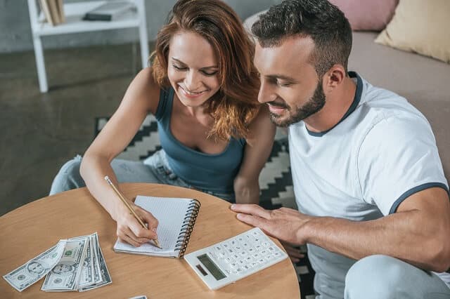 happy-couple-financial-planning-medium